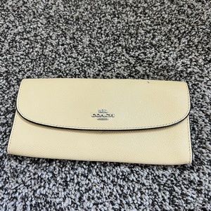 Cute yellow coach wallet